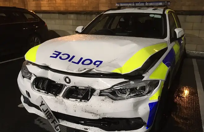 A police car was badly damaged.