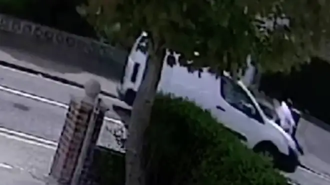 The moment a man is struck by a van in broad daylight.